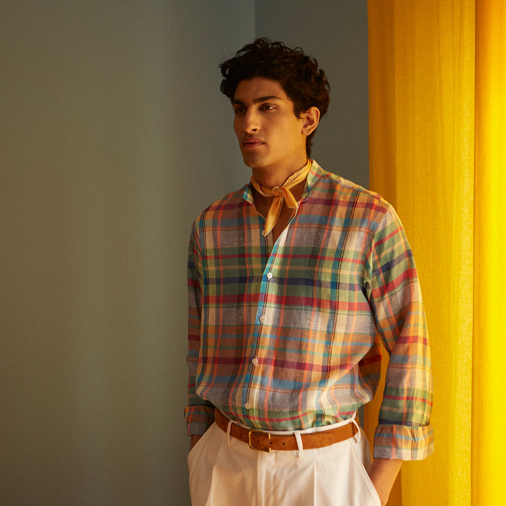 The Turnbull & Asser Red and Teal Madras Check Weekend Fit Linen Shirt features a stand collar, 1-button cuff, and colorful plaid pattern, shown against a white background.