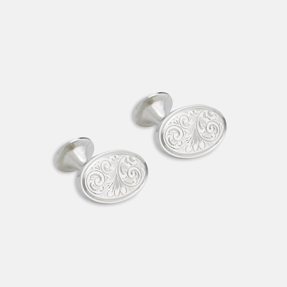 The Turnbull & Asser STERLING SILVER ART CUFFLINKS have oval faces with an engraved swirl pattern, finished elegantly against a plain white background.