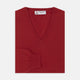 The Deep Red V-Neck Cashmere Jumper by Turnbull & Asser features long sleeves, ribbed cuffs and collar, and an inner collar label. Displayed on a white background, it's ideal for smart casual looks.