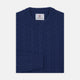 The Blue Crew Neck Cable Knit Cashmere Jumper by Turnbull & Asser features a chunky cable knit, ribbed crew neck and cuffs, and a visible label inside the collar.