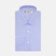 A Turnbull & Asser Light Blue Herringbone Sea Island Quality Cotton Shirt with T&A collar and double cuffs is neatly folded, label visible, and displayed against a plain white background.