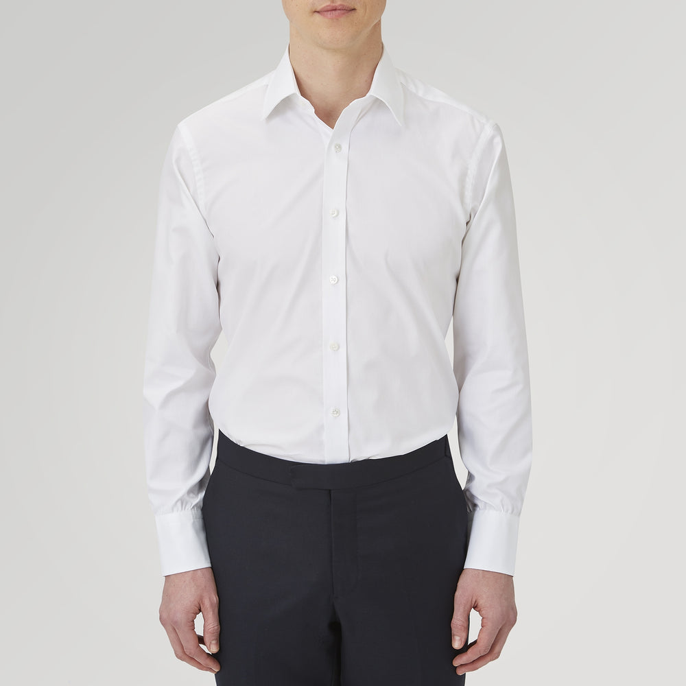 The Turnbull & Asser White Superfine Oxford Cotton Shirt features a T&A collar and 3-button cuffs, elegantly displayed against a light grey background.