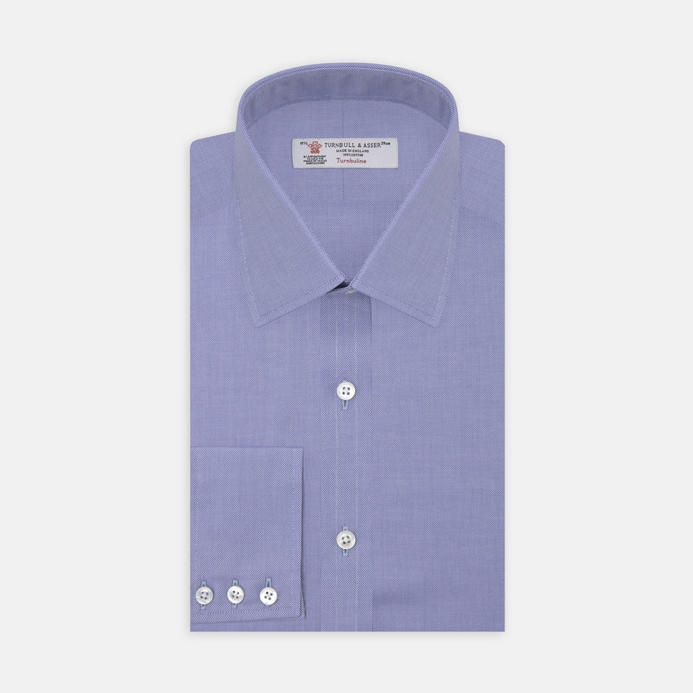 A Blue Superfine Oxford Cotton Shirt by Turnbull & Asser, featuring a T&A collar and 3-button cuffs, is displayed against a plain white background.
