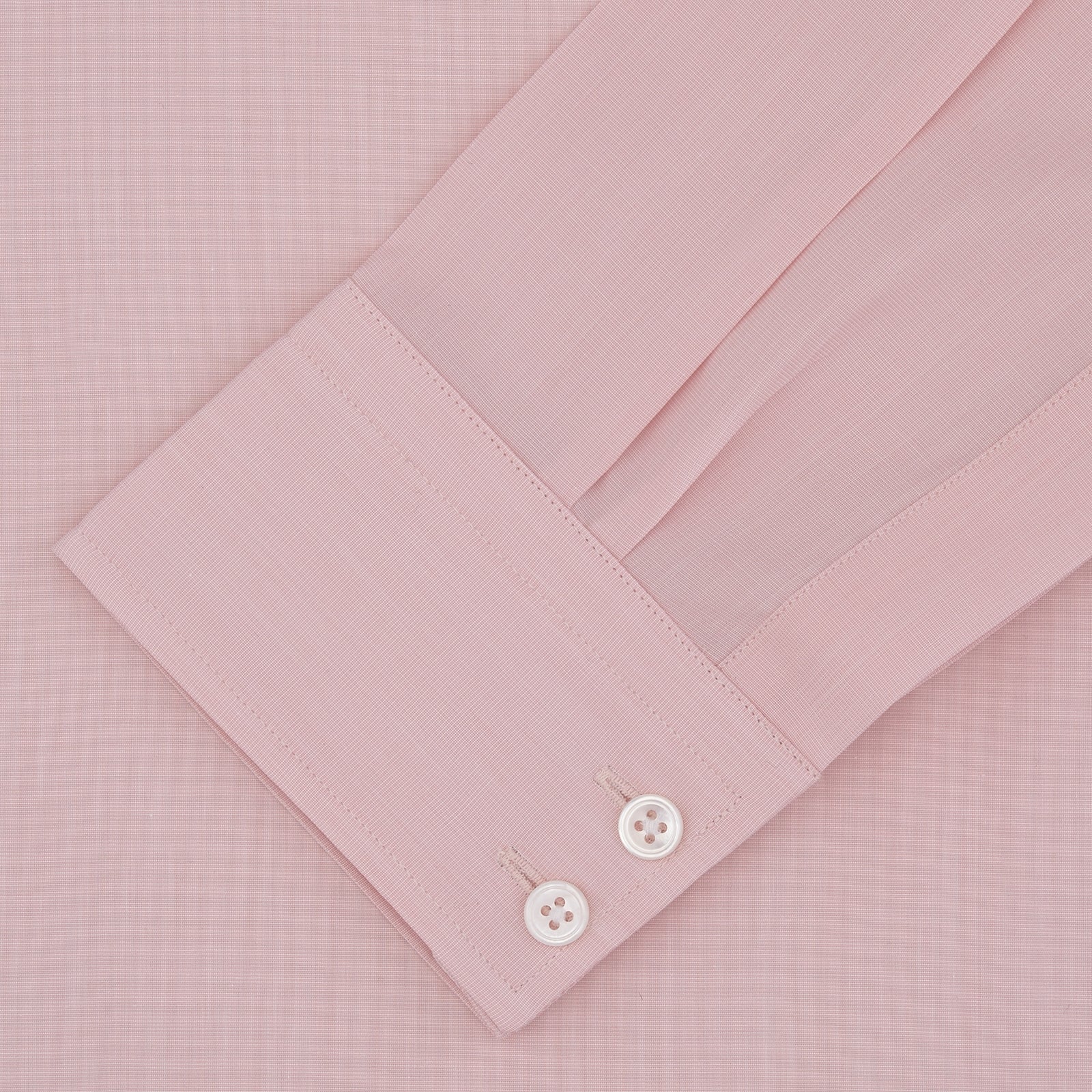 View 2 of product A neatly folded dark blue end-on-end Turnbull & Asser shirt with a T&A collar and 3-button cuffs, displayed against a plain white background. The label inside the collar is visible.