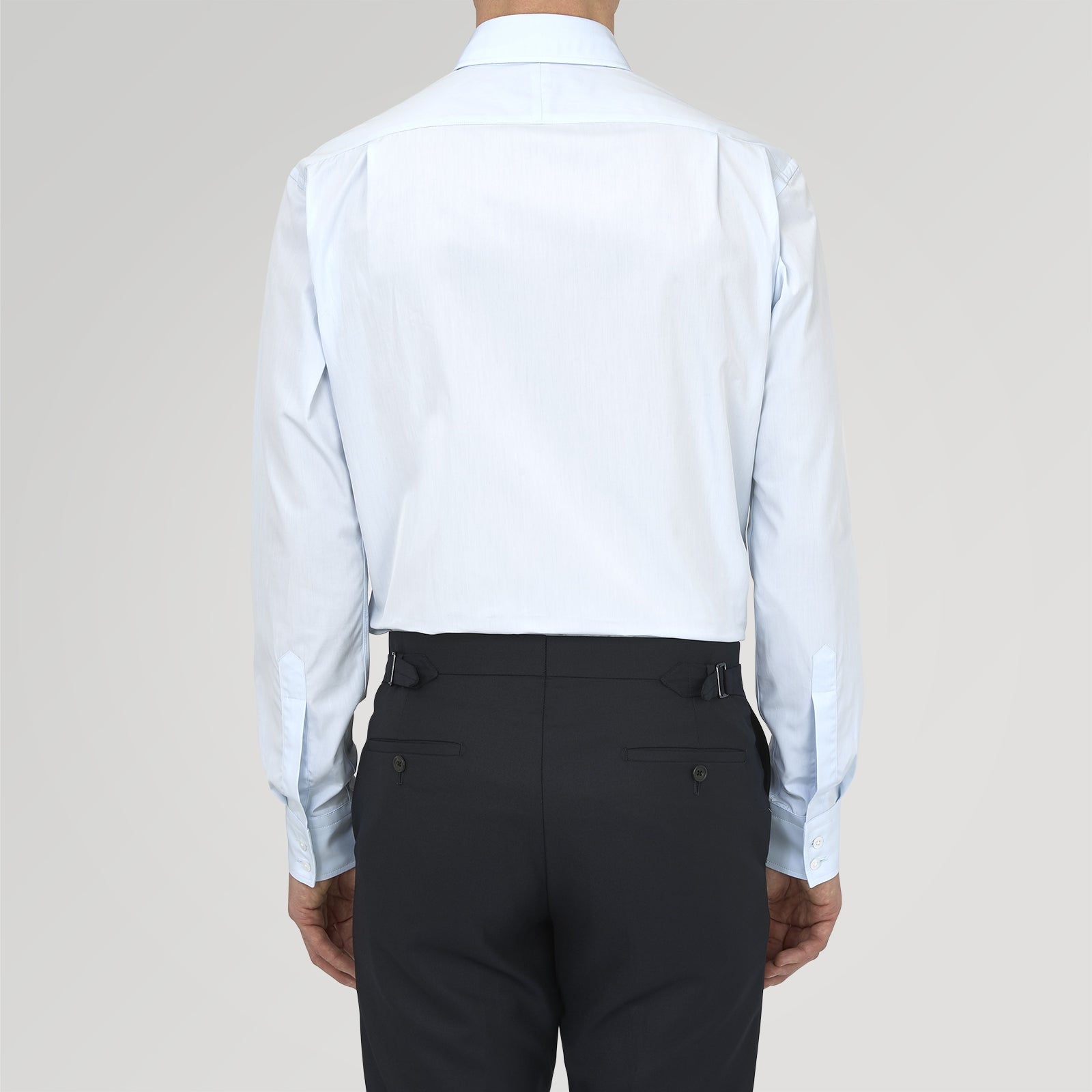 View 3 of product Turnbull & Asser's Tailored Fit Two-Fold 120 Light Blue Shirt features a classic Kent collar, white buttons, long sleeves with 2-button cuffs, and an inner collar label.
