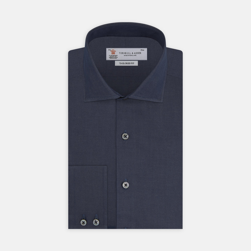 A neatly folded Tailored Fit Navy Cashmere Blend Shirt with a Kent collar and 2-button cuffs by Turnbull & Asser is shown on a plain white background.