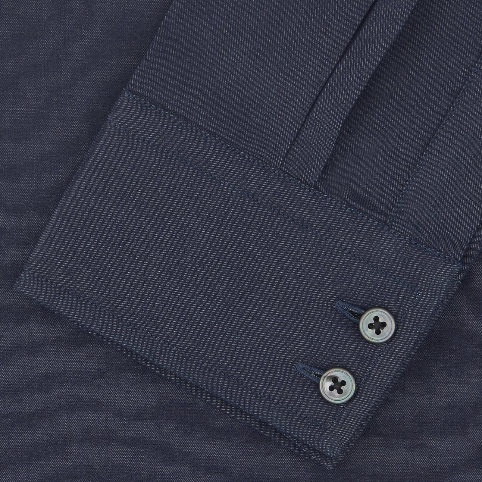 View 2 of product A neatly folded Tailored Fit Navy Cashmere Blend Shirt with a Kent collar and 2-button cuffs by Turnbull & Asser is shown on a plain white background.