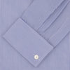 View 4 of product The Turnbull & Asser Tailored Fit Blue Fine Bengal Stripe Cotton Shirt features a Kent collar, double cuffs, and thin white stripes. Displayed neatly folded against a white background.