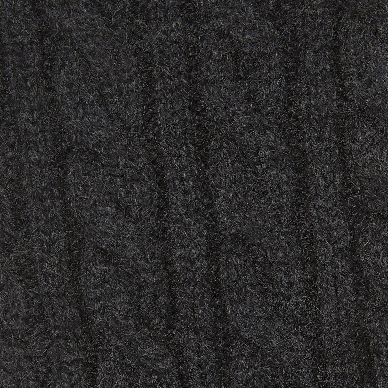 View 2 of product A Charcoal Cable Knit Cashmere Sock by Turnbull & Asser, featuring a ribbed cuff, is shown against a plain white background.