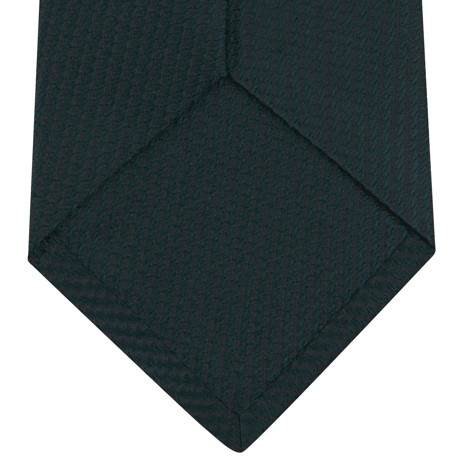 View 4 of product The Turnbull & Asser Forest Green Lace Silk Tie, shown rolled on a white background, features a lace weave texture and brings versatile style to any wardrobe.
