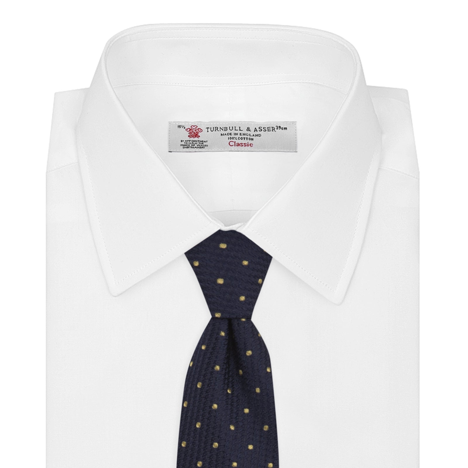 View 2 of product The Turnbull & Asser Navy and Gold Spot Lace Silk Tie, ideal for office wear, is shown rolled up on a white background.