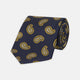 The Turnbull & Asser Navy and Gold Floating Paisley Silk Tie features a repeating yellow and white paisley pattern, shown rolled with the pointed end facing forward against a white background.