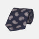 The Turnbull & Asser Navy and Light Pink Floating Paisley Silk Tie features a classic pink and white paisley pattern—a timeless accessory to enhance any wardrobe.