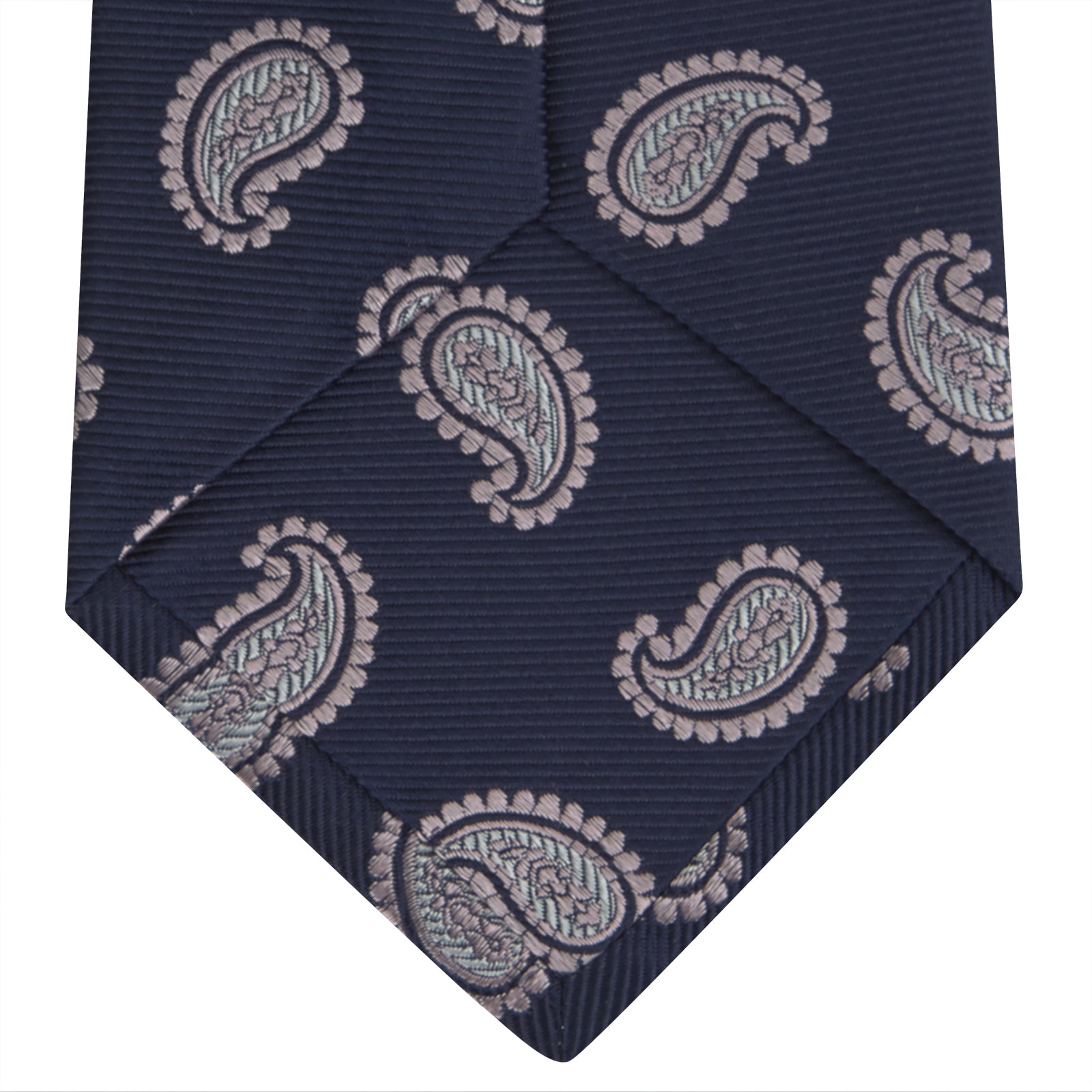 View 4 of product The Turnbull & Asser Navy and Light Pink Floating Paisley Silk Tie features a classic pink and white paisley pattern—a timeless accessory to enhance any wardrobe.