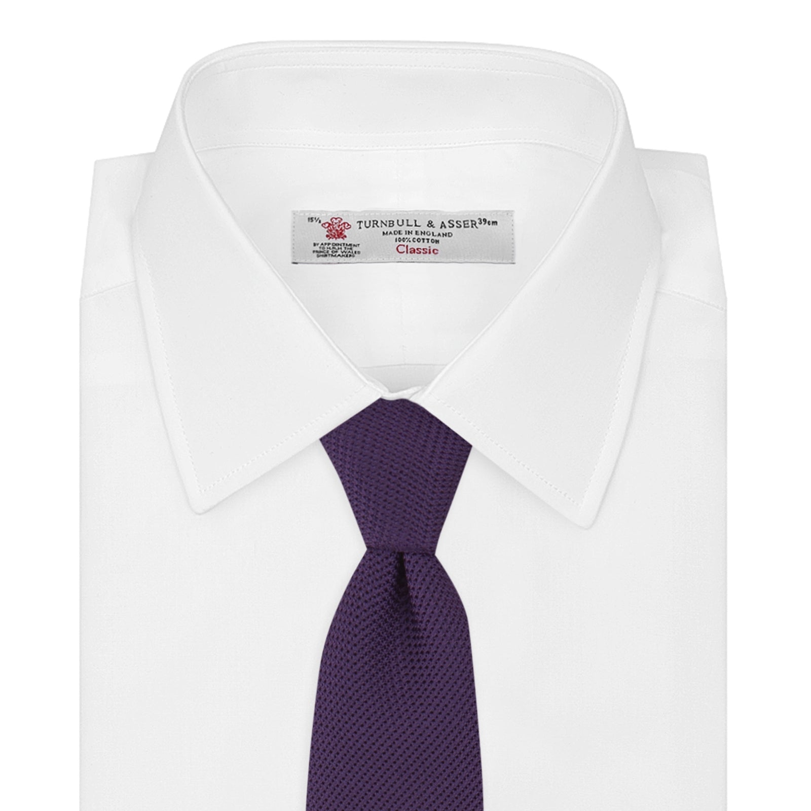 View 2 of product The Turnbull & Asser Plum Grenadine Silk Tie, featuring a textured grenadine weave, is shown rolled up on a plain white background.