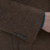 View 4 of product The Hopton Brown Herringbone Wool Coat by Turnbull & Asser is displayed against a white background.