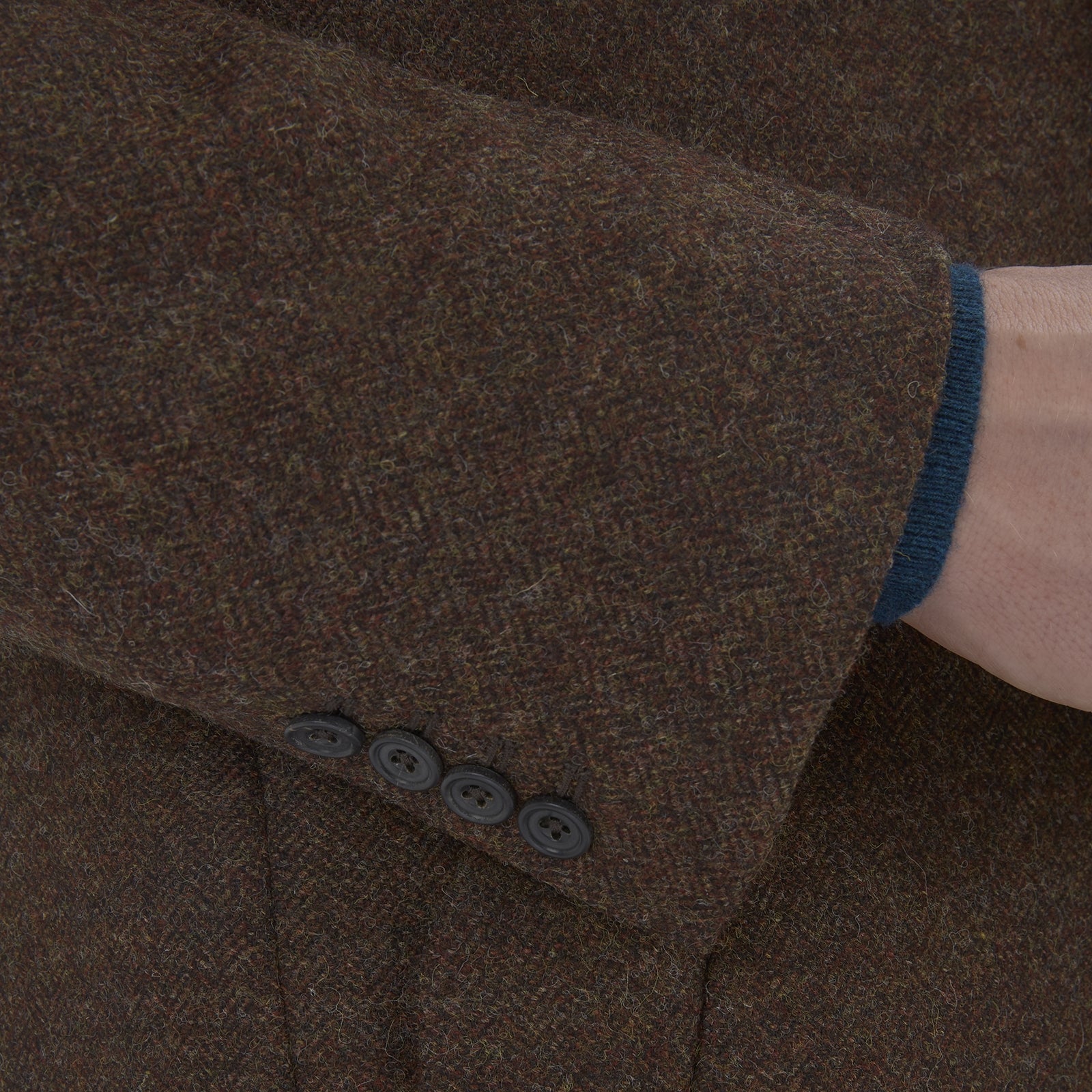 View 4 of product The Hopton Brown Herringbone Wool Coat by Turnbull & Asser is displayed against a white background.