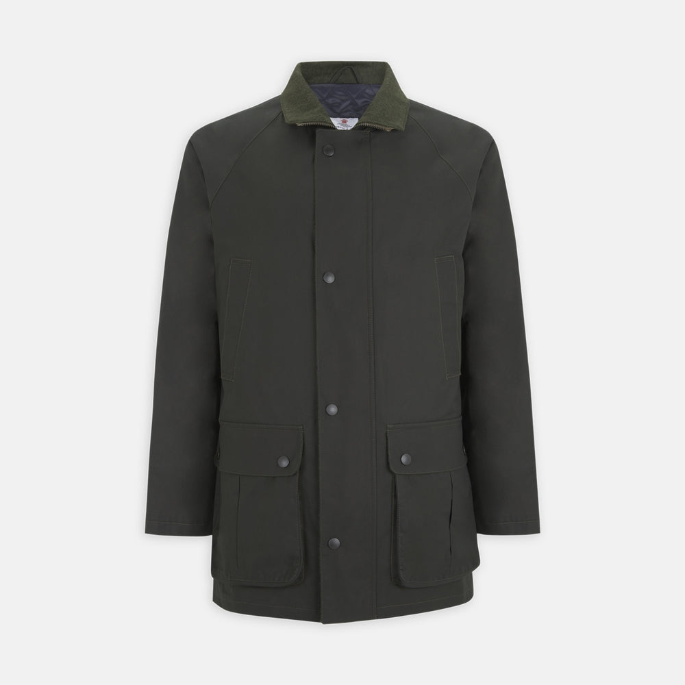 The Turnbull & Asser Dark Green Waxed Cotton Field Coat features a straight fit, button-up front, two large bottom flap pockets, slanted chest pockets, and a contrasting collar. Shown against a plain white background.