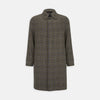 View 1 of product The Turnbull & Asser Checked Wool Car Coat features a straight-cut silhouette in brown and gray Prince of Wales check, classic collar, concealed front buttons, long sleeves, and a minimalist tailored design.
