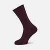 View 1 of product A single Burgundy Short Cotton Sock by Turnbull & Asser, featuring a ribbed texture and lustrous finish, is displayed upright against a plain white background.