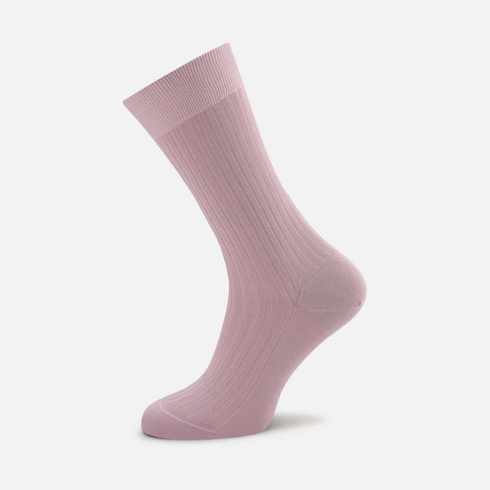 A single Dusky Pink Short Pure Cotton Sock by Turnbull & Asser stands upright against a plain white background, showcasing its ribbed design and fine craftsmanship.