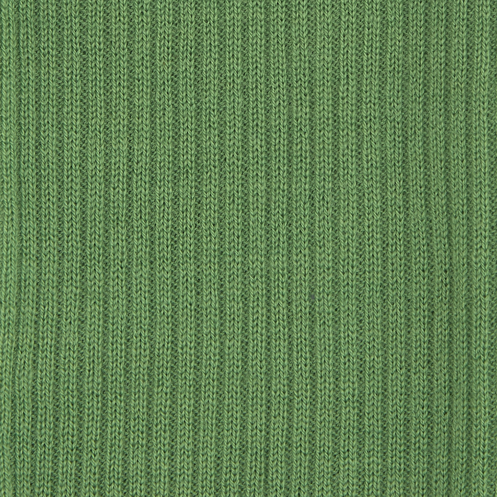 A single Turnbull & Asser Green Long Merino Wool Sock is shown in side profile on a white background, its ribbed texture and snug fit visible—ideal for those seeking luxury men's socks.
