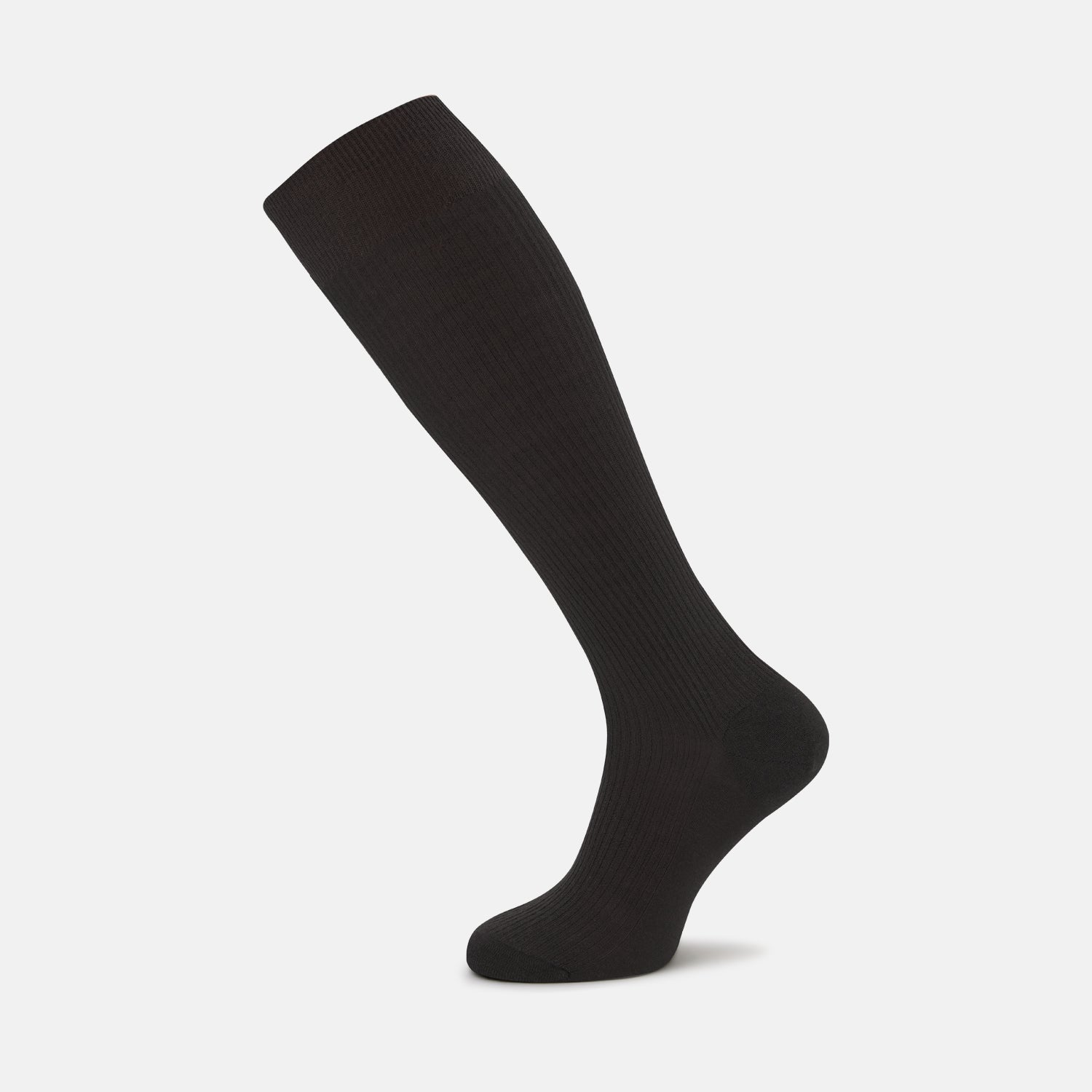 View 1 of product The Turnbull & Asser Chocolate Brown Long Merino Wool Sock is displayed on a white background, positioned as if worn, showcasing its subtle ribbed texture—highlighting the refined elegance of luxury men's socks.