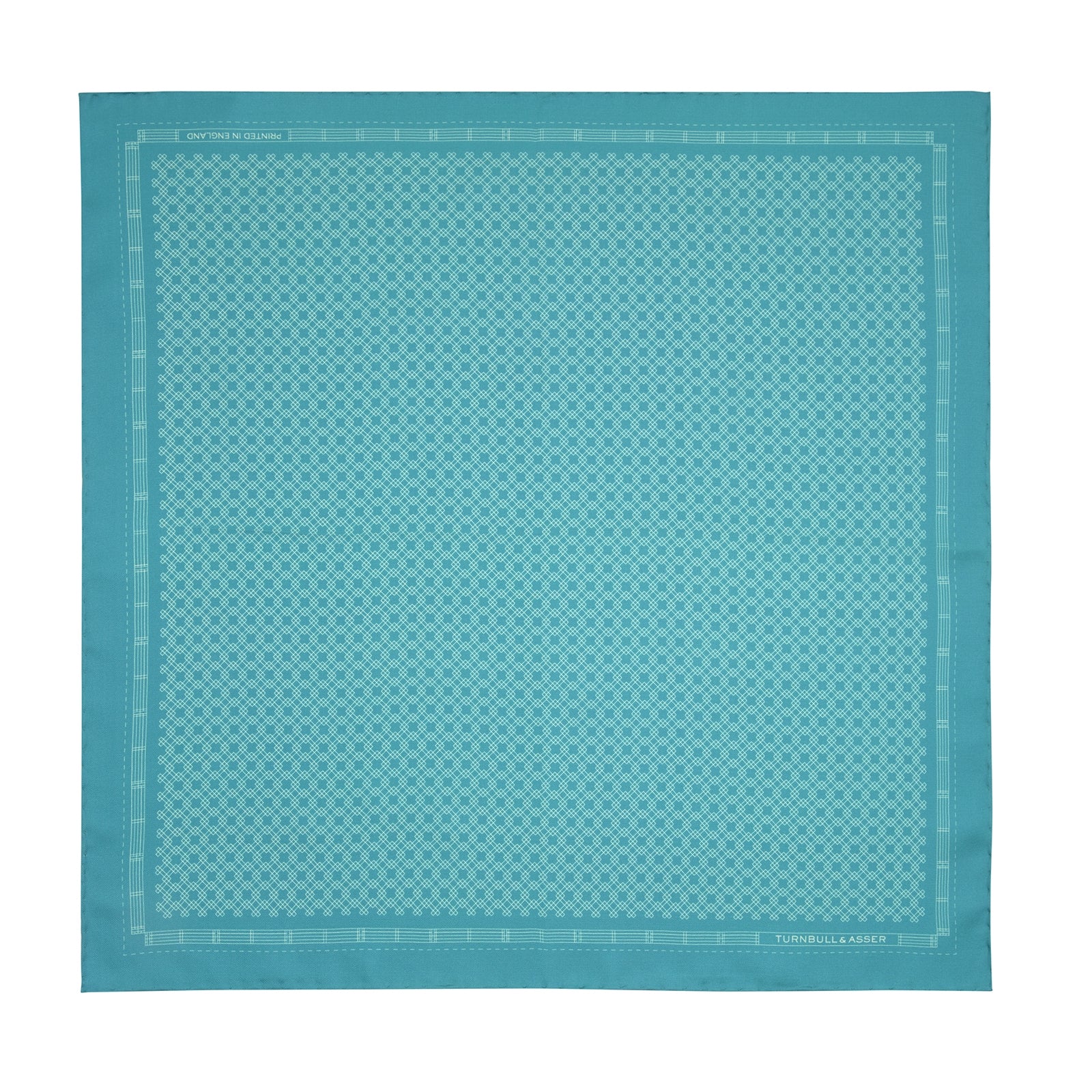 View 2 of product The Kingfisher Green Monocle Silk Pocket Square by Turnbull & Asser features an elegant geometric pattern and border, with the Turnbull & Asser name displayed in white on the lower right corner.