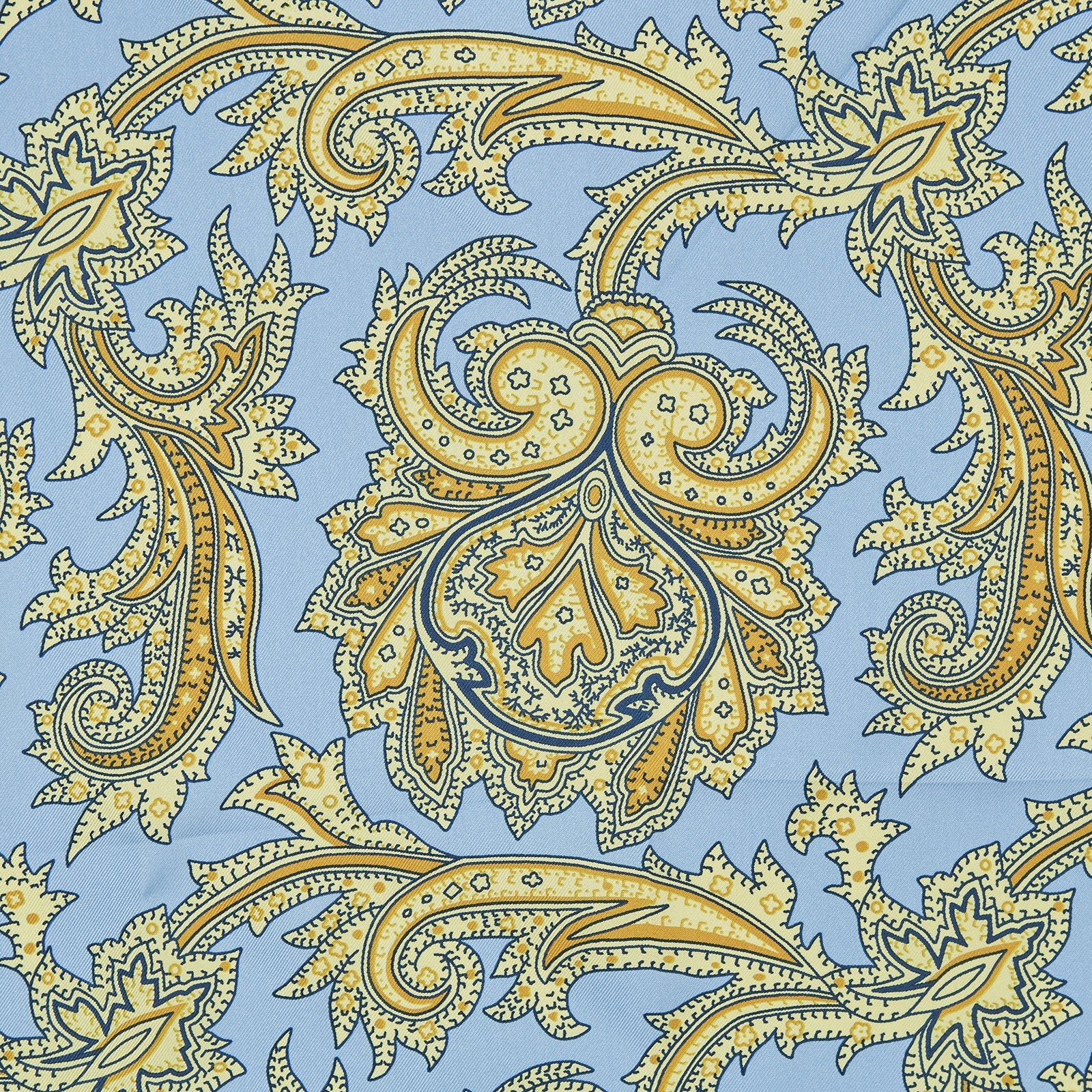 View 3 of product A folded Light Blue and Yellow Large Paisley Silk Pocket Square by Turnbull & Asser features an intricate paisley design. The brand name appears in white on the bottom right corner.