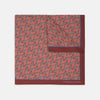 View 1 of product The Turnbull & Asser Red and Pink Arrow Silk Pocket Square features a striking pattern and luxurious silk, perfect for adding elegance to any look.