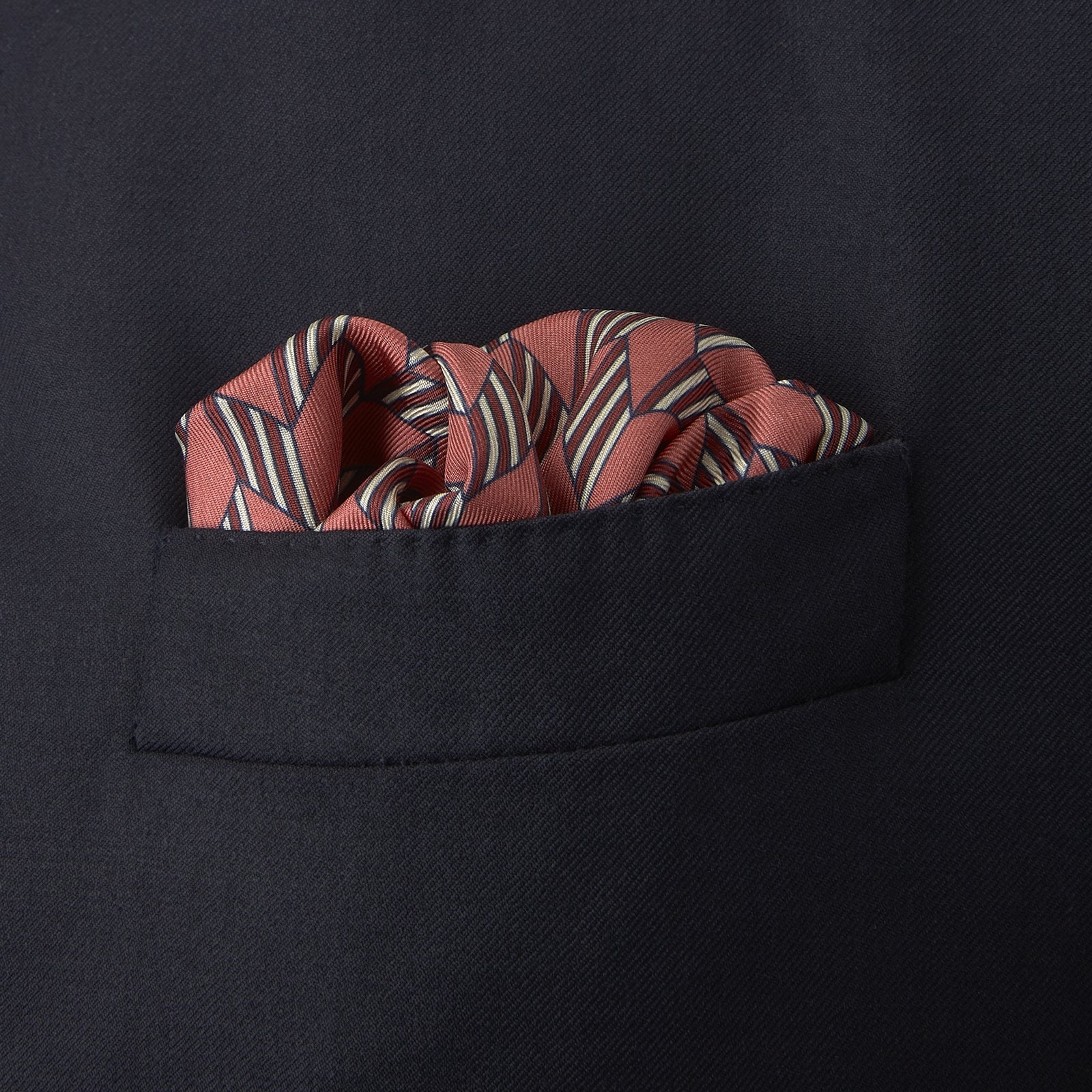 View 4 of product The Turnbull & Asser Red and Pink Arrow Silk Pocket Square features a striking pattern and luxurious silk, perfect for adding elegance to any look.