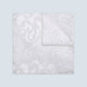 The Turnbull & Asser White House Paisley Hand-Rolled Silk Pocket Square is shown neatly folded to reveal both sides of its white woven fabric, ideal for black tie, set against a light gray background.