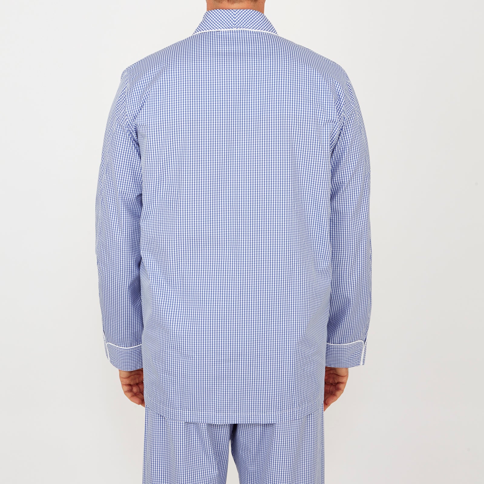 View 3 of product The Turnbull & Asser Mid Blue Gingham Check Piped Cotton Pyjama Set features white piping, two buttons, and a matching fabric belt, displayed on a white background—ideal for lovers of classic luxury sleepwear.