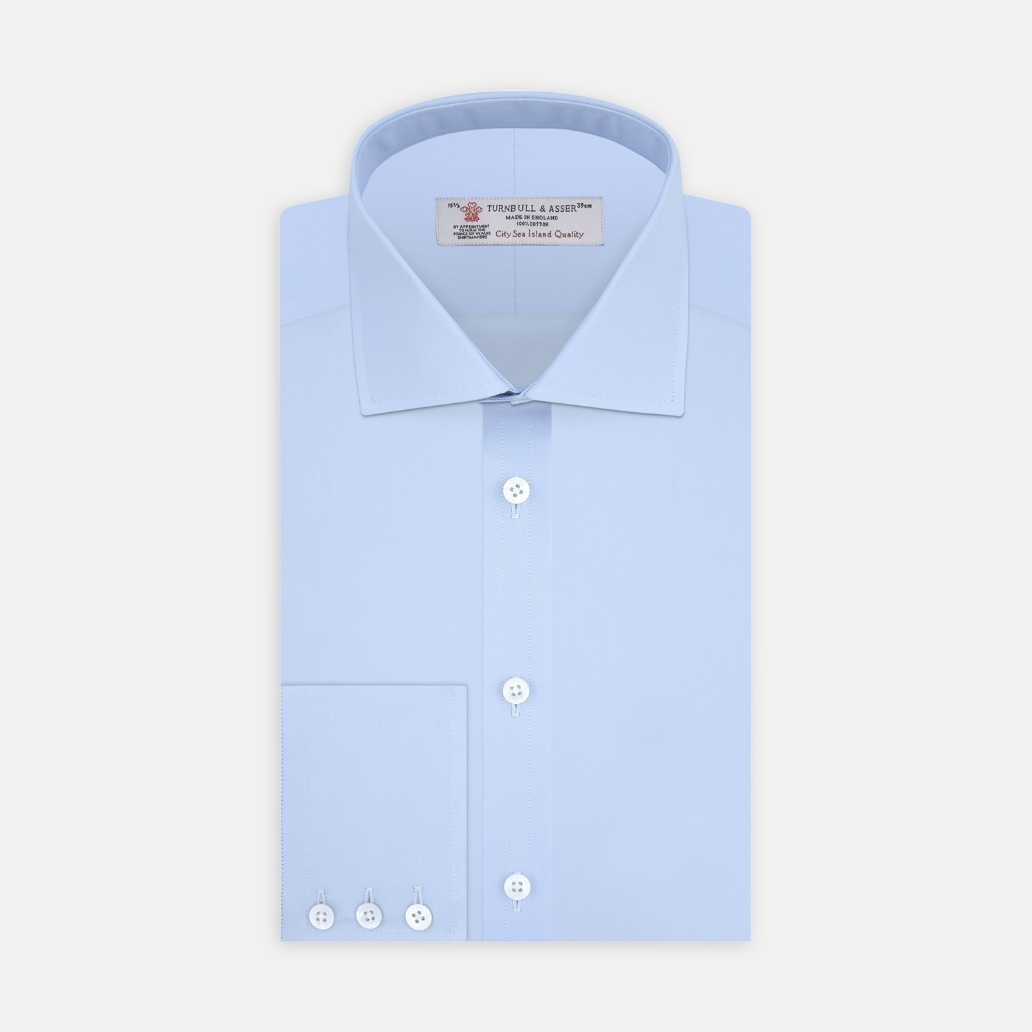 View 1 of product The Turnbull & Asser Blue Sea Island Quality Cotton Shirt features a Dr. No collar and button cuffs, crafted from fine cotton and shown neatly folded on a plain white background.