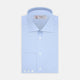 The Turnbull & Asser Blue Sea Island Quality Cotton Shirt features a Dr. No collar and button cuffs, crafted from fine cotton and shown neatly folded on a plain white background.