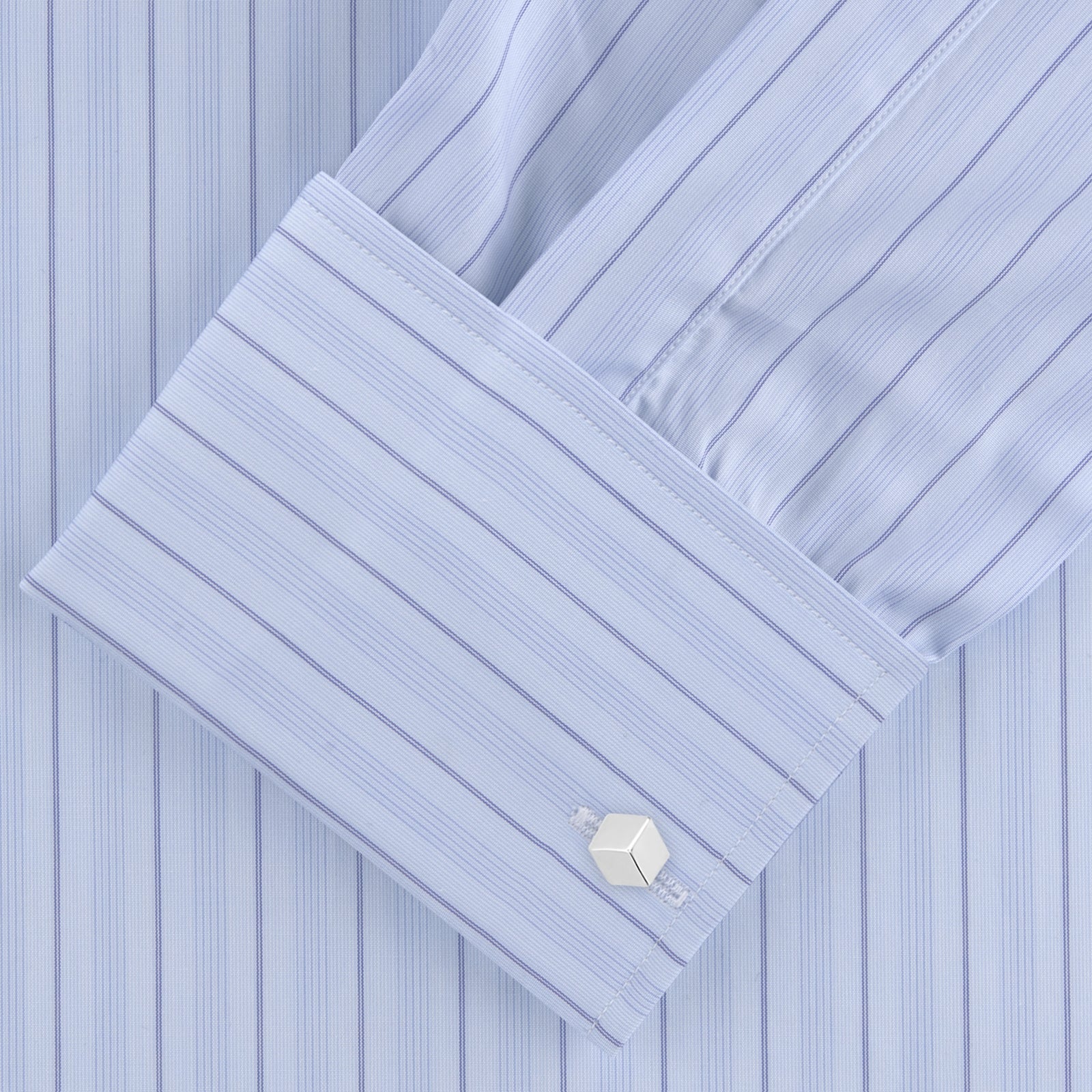 View 2 of product The Turnbull & Asser Blue Mixed Stripe Shirt with T&A Collar and Double Cuffs, ideal for striped shirt enthusiasts, is neatly folded and displayed against a plain white background.