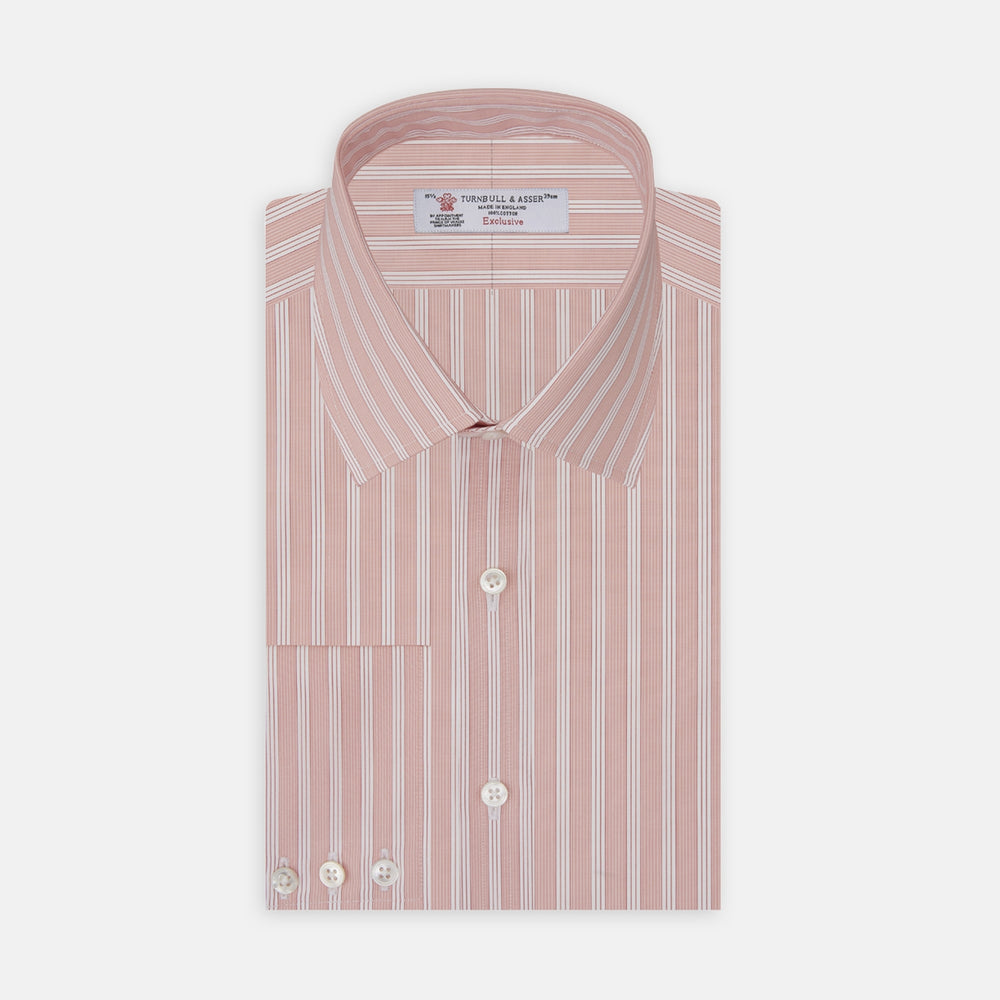 The Turnbull & Asser Pink and White Bold Stripe Shirt features a T&A collar, long sleeves, 3-button cuffs, and striking vertical stripes. The shirt is displayed folded with white buttons against a white background.