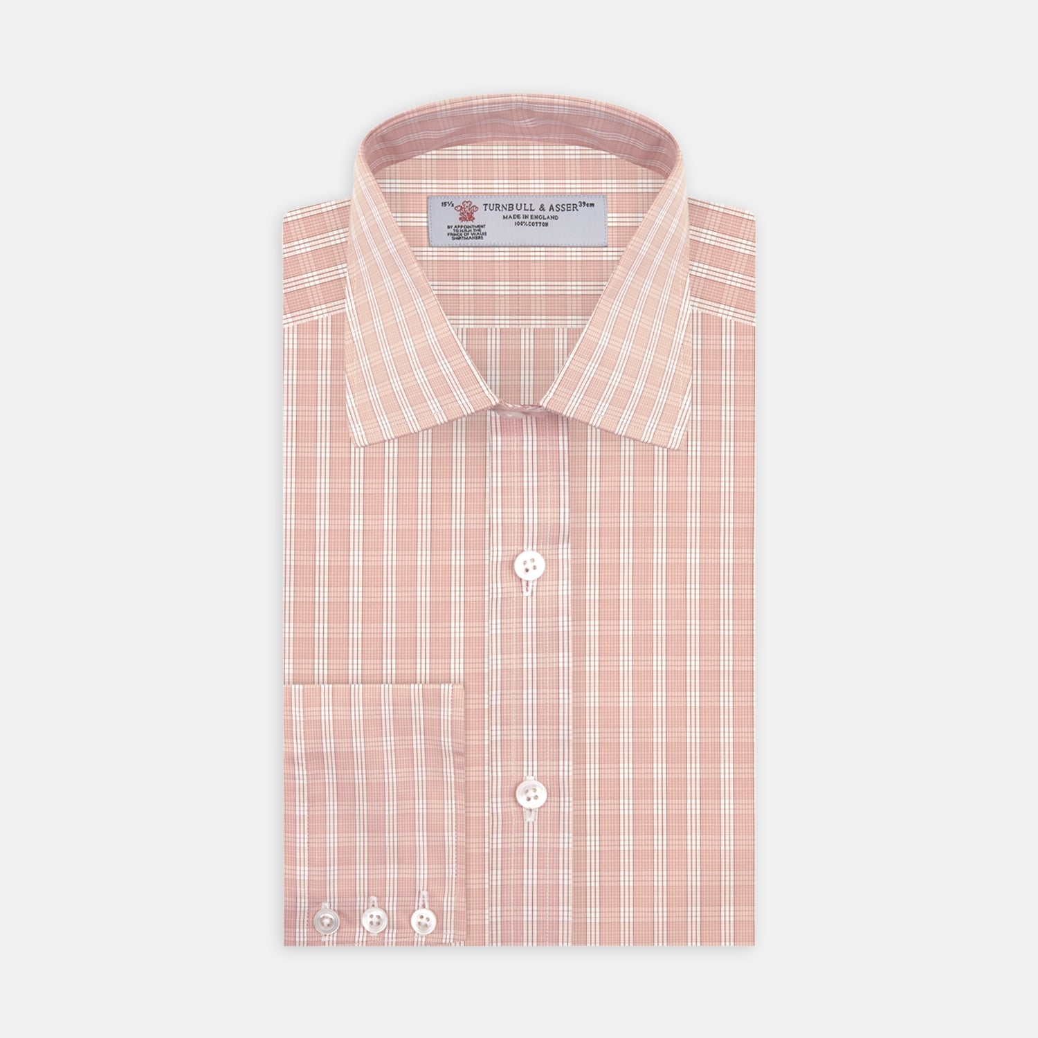 View 1 of product The Turnbull & Asser Pink and White Bold Check Shirt features a T&A collar and 3-button cuffs, displayed folded on a plain white background.