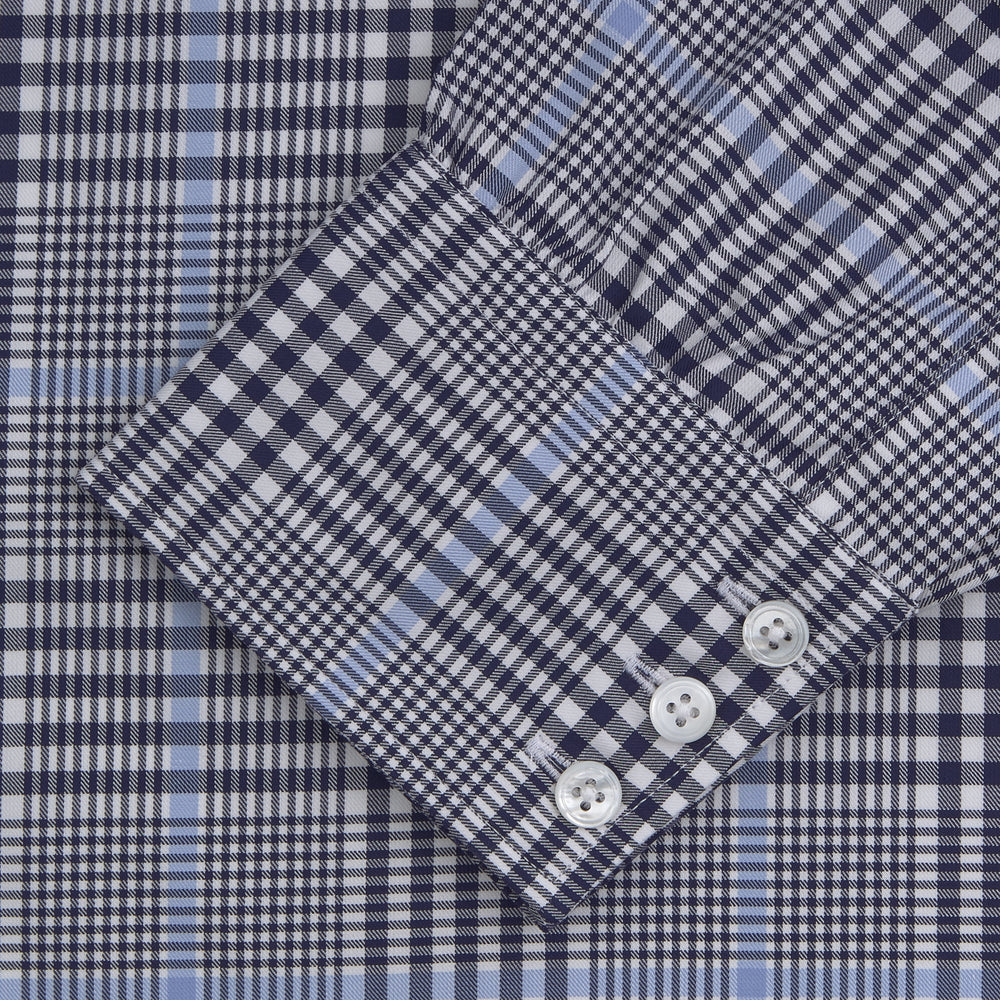 The Turnbull & Asser Navy and Light Blue Archive Check Shirt features a T&A collar, 3-button cuffs, and a classic check pattern—an elegant example of refined shirtmaking.