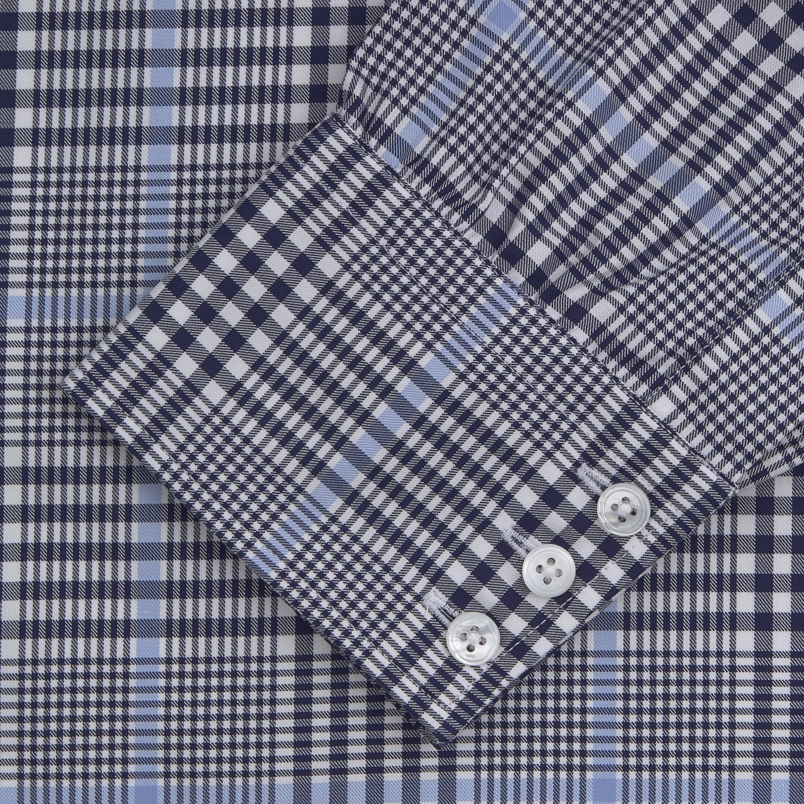 View 2 of product The Turnbull & Asser Navy and Light Blue Archive Check Shirt features a T&A collar, 3-button cuffs, and a classic check pattern—an elegant example of refined shirtmaking.