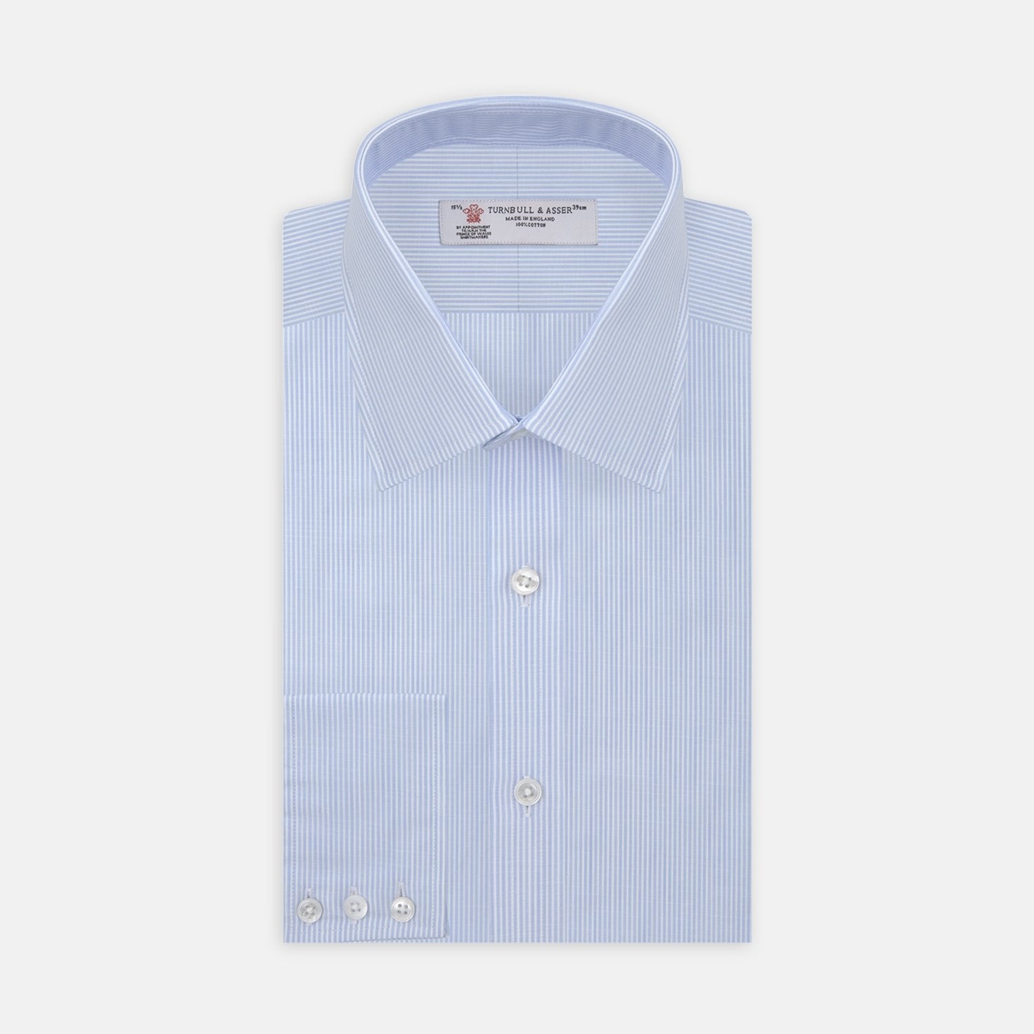 View 2 of product A close-up of Turnbull & Asser’s Light Blue and White Stripe Chambray Fabric shows its vertical pinstripes, captured in a gray-bordered circular frame on a white background.