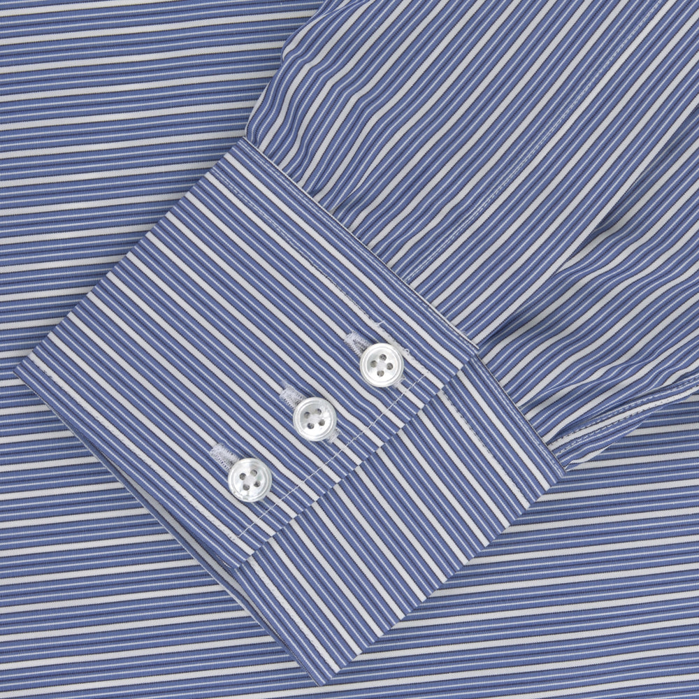 The Turnbull & Asser Navy Rich Stripe Shirt features a T&A collar, 3-button cuffs, blue with white vertical stripes, and a button-down front—shown laid flat on a white background.