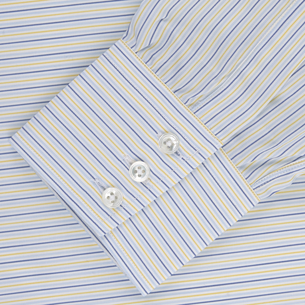 The Turnbull & Asser Yellow and Navy Small Stripe Shirt features a T&A collar, 3-button cuffs, and vertical stripes, laid flat on a white background.