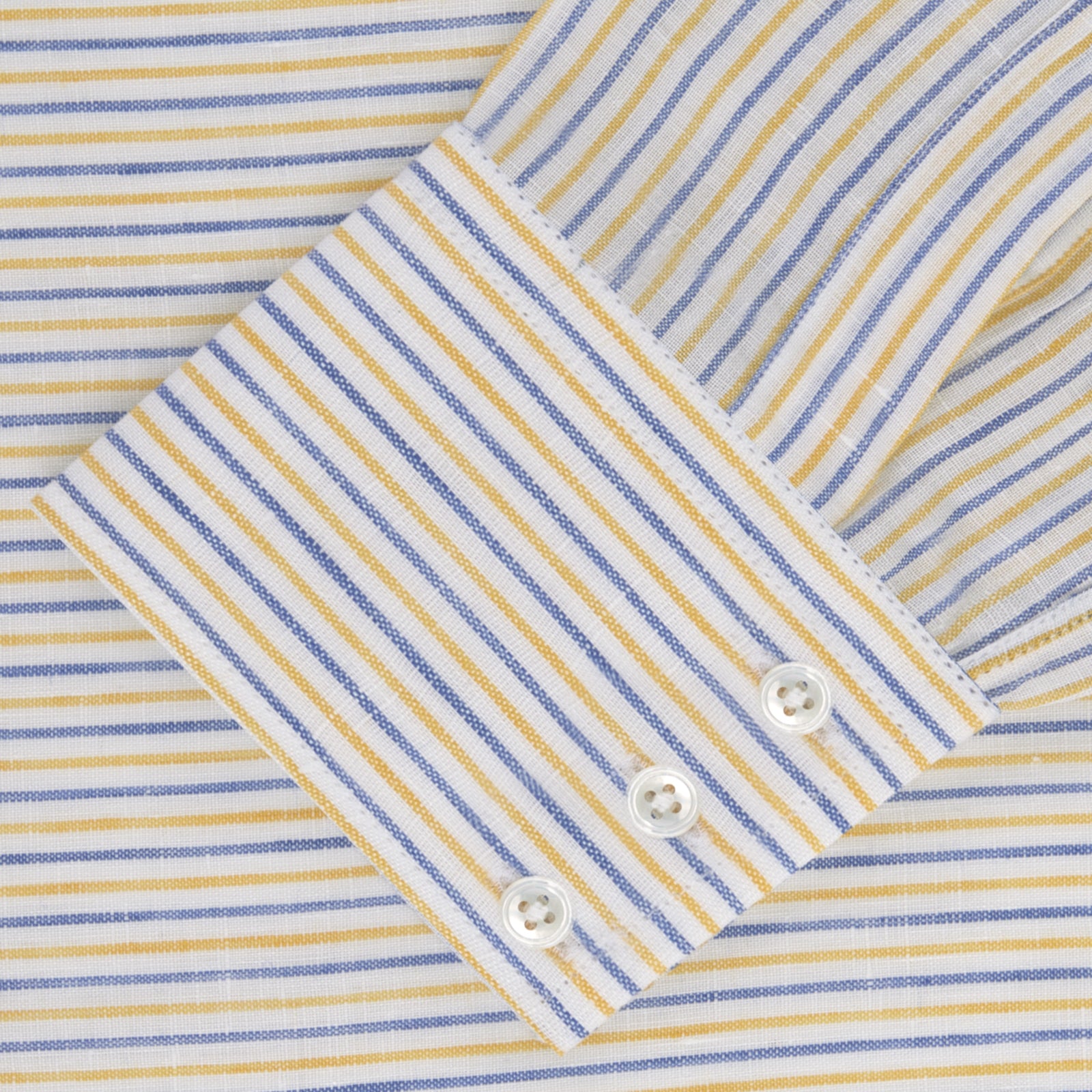 View 2 of product Turnbull & Asser's Yellow and Blue Ticking Stripe Linen Shirt features a POW collar and 3-button cuffs, displayed on a plain light gray background.