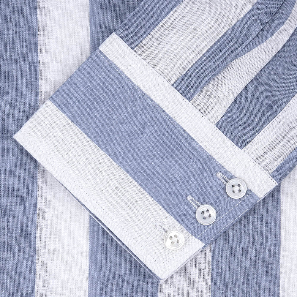 Turnbull & Asser's Tailored Fit Blue and White Stripe Linen Shirt features wide vertical stripes, a concealed button-down collar, and button cuffs—perfect for spring style.