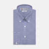 View 1 of product The Turnbull & Asser Weekend Fit Blue Puppytooth Shirt features a Dorset collar, 1-button cuffs, and a blue and white small check pattern. It is neatly folded with white buttons, displayed on a plain white background.