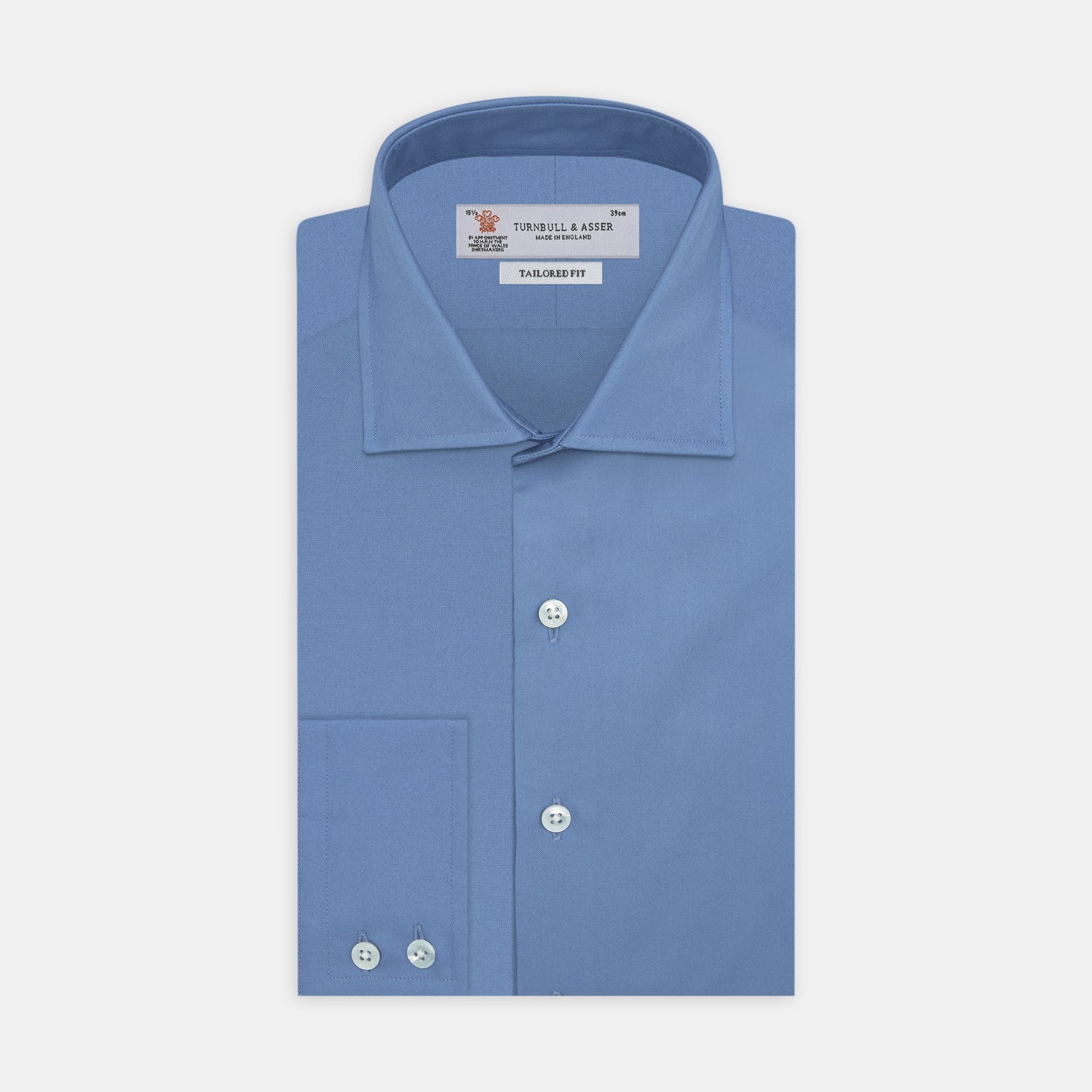 View 1 of product The Turnbull & Asser Tailored Fit Deep Blue Cotton Shirt features a classic Kent collar and 2-button cuffs, shown neatly folded with white buttons against a plain white background.