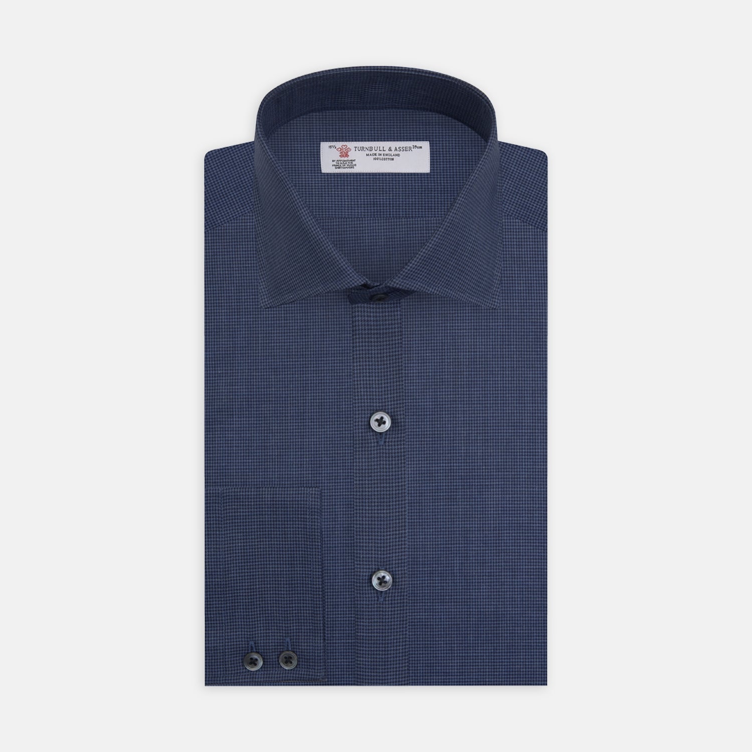 View 1 of product The Turnbull & Asser Tailored Fit Navy Check Flannel Shirt with Kent Collar and 2-button cuffs is neatly folded and displayed against a plain white background.