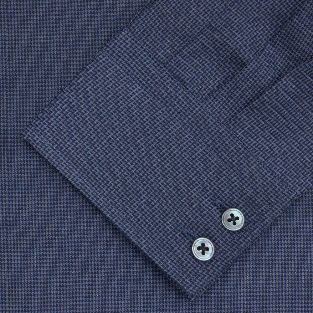 The Turnbull & Asser Tailored Fit Navy Check Flannel Shirt with Kent Collar and 2-button cuffs is neatly folded and displayed against a plain white background.