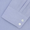 View 2 of product A neatly folded Turnbull & Asser Blue Hairline Stripe Tailored Fit Shirt with a Kent collar and double cuffs is displayed on a plain white background, with the brand label visible inside the collar.